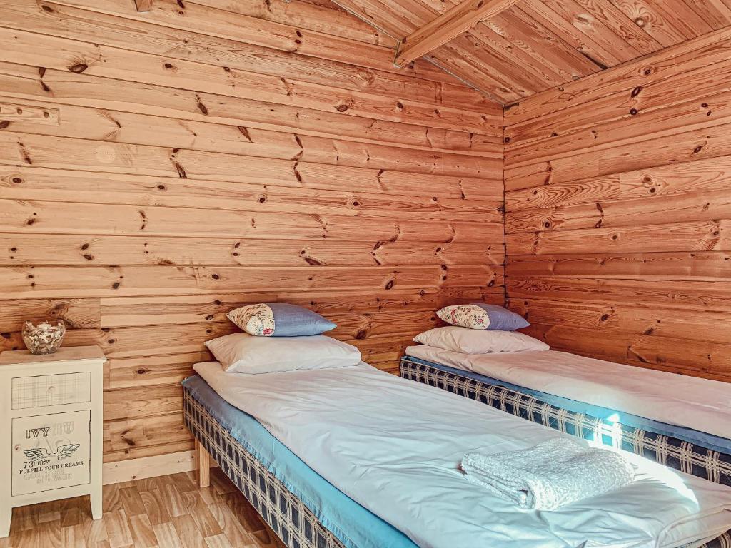 Postel nebo postele na pokoji v ubytování Pruuli Puhkeküla