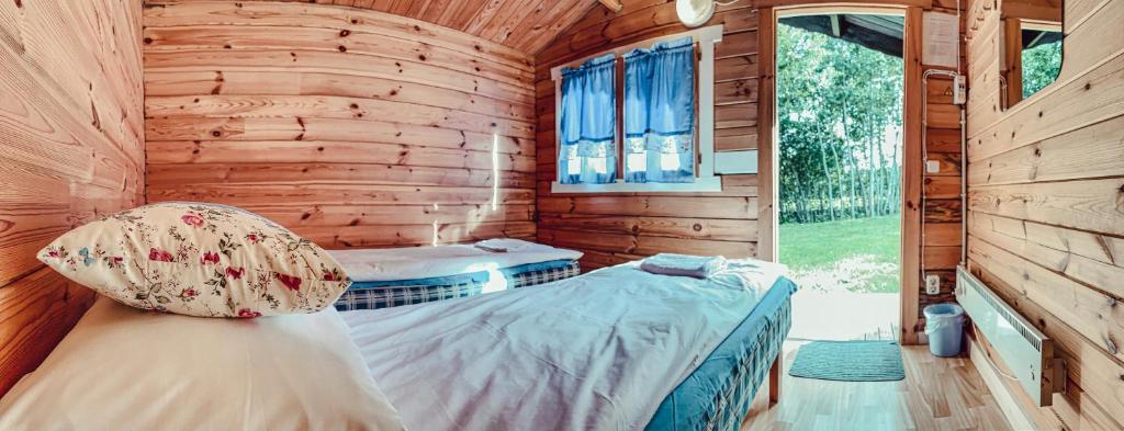 Postel nebo postele na pokoji v ubytování Pruuli Puhkeküla