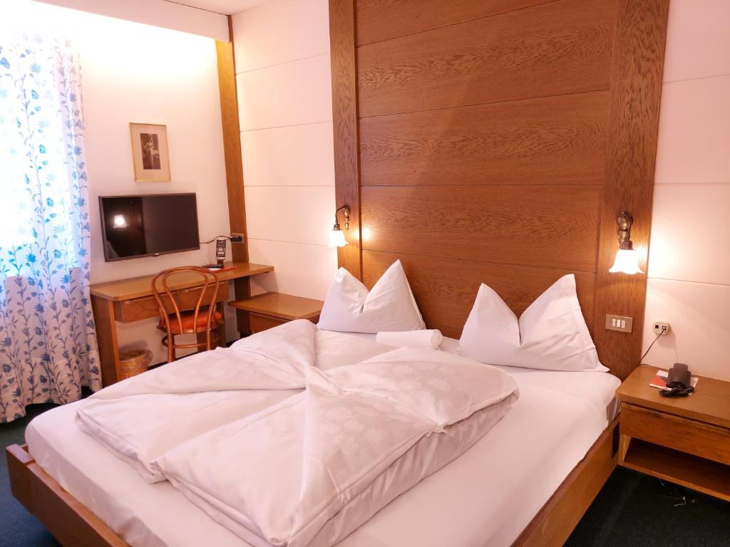 Voodi või voodid majutusasutuse Hotel Schuster toas