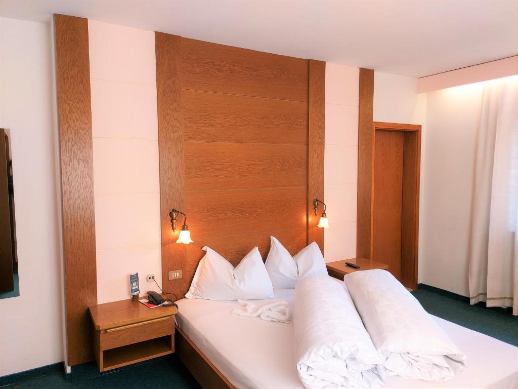 Voodi või voodid majutusasutuse Hotel Schuster toas