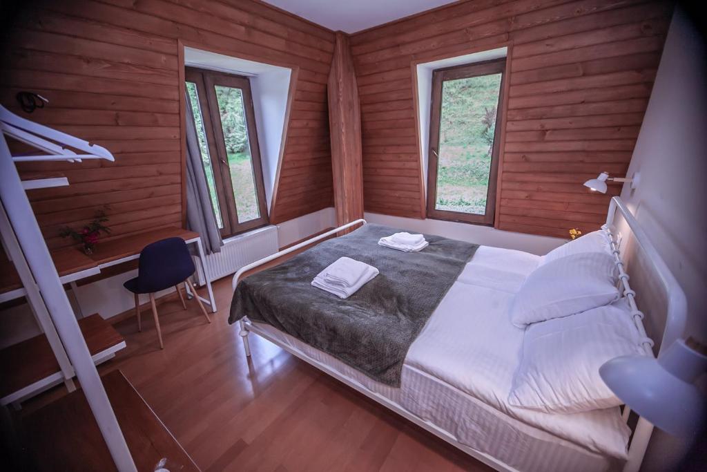 Postel nebo postele na pokoji v ubytování Latour Mestia