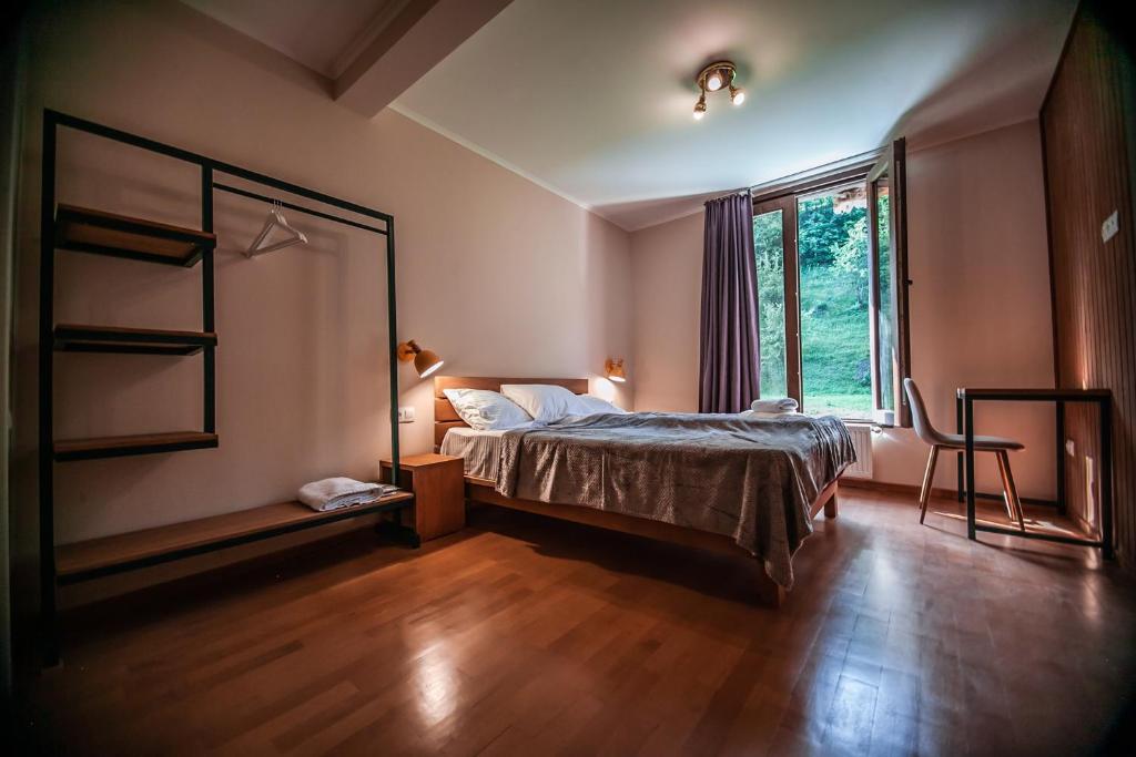 Postel nebo postele na pokoji v ubytování Latour Mestia