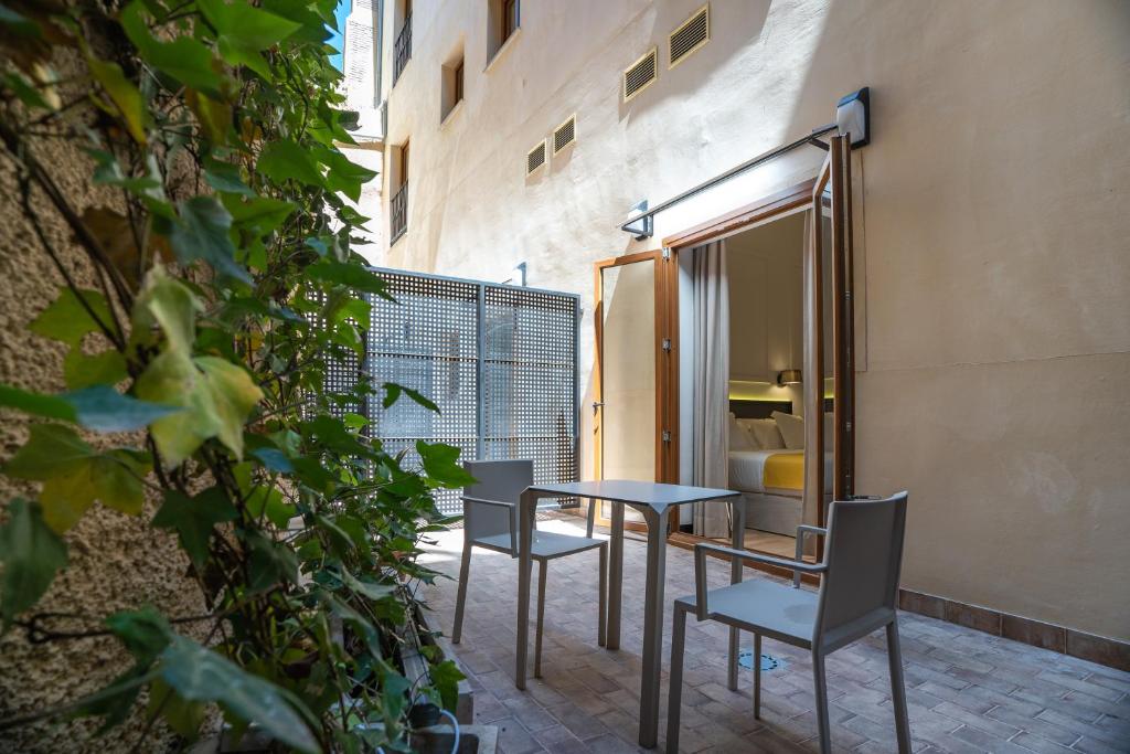 Balkón nebo terasa v ubytování Hotel Boutique Puerta de las Granadas
