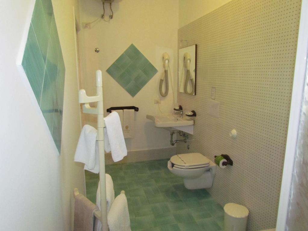 Koupelna v ubytování Pietra Pomice Hotel