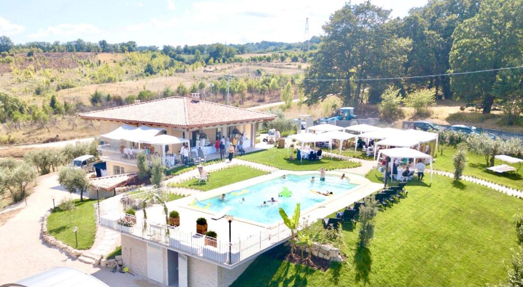 an aerial view of a resort with a swimming pool at OASI PA.CI. COUNTRY HOUSE in Montemiletto