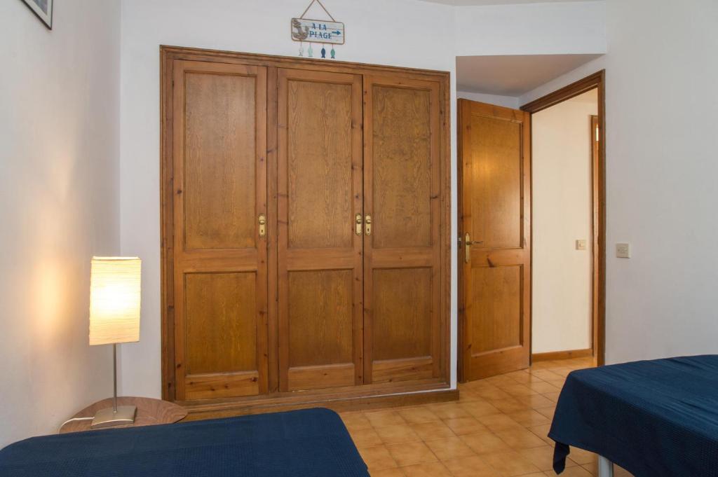 Postel nebo postele na pokoji v ubytování K-4 CALELLA DE PALAFRUGELL, 4 Pax