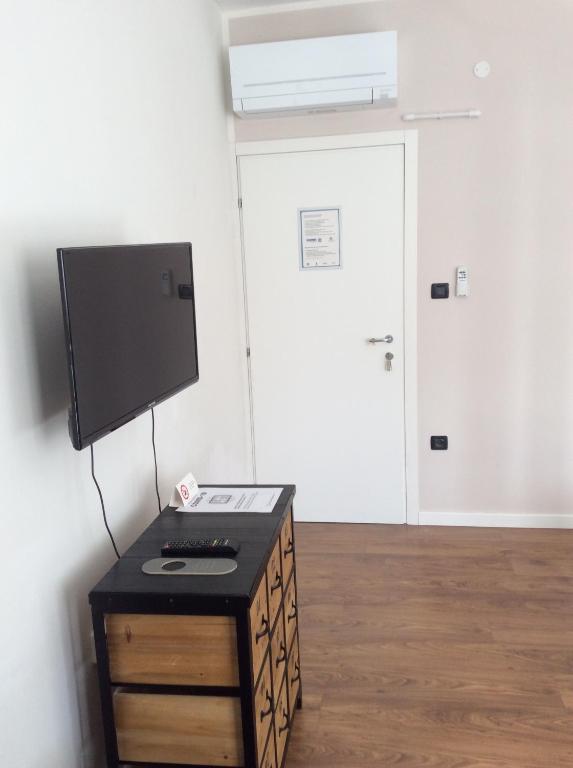 TV a/nebo společenská místnost v ubytování Riva City View