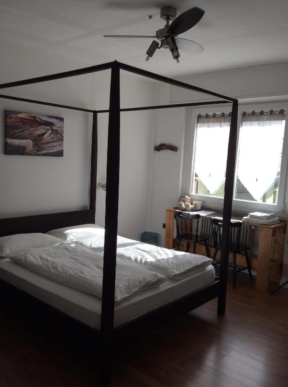 Postel nebo postele na pokoji v ubytování Riva City View