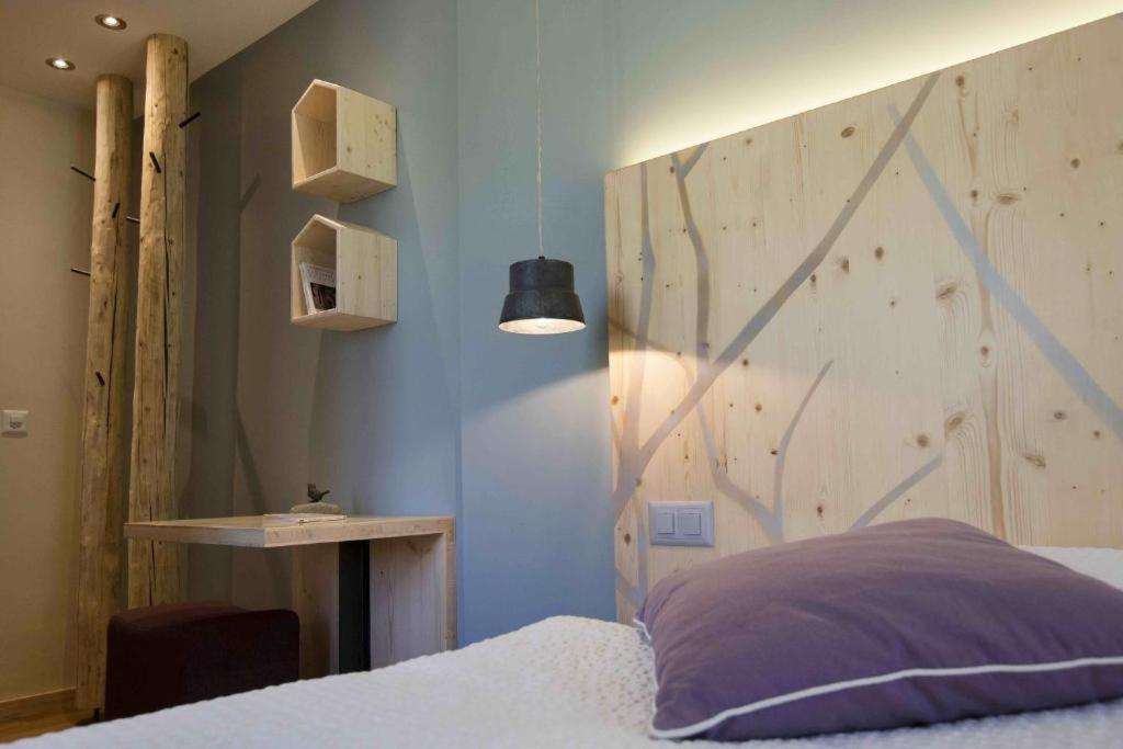 Voodi või voodid majutusasutuse Auberge de l'Hospice toas