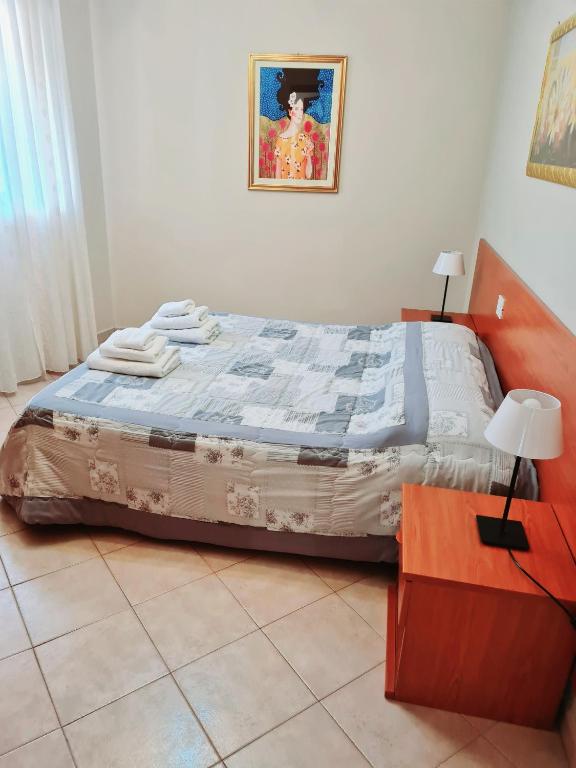 Posteľ alebo postele v izbe v ubytovaní Casa Colonna Montegrotto terme