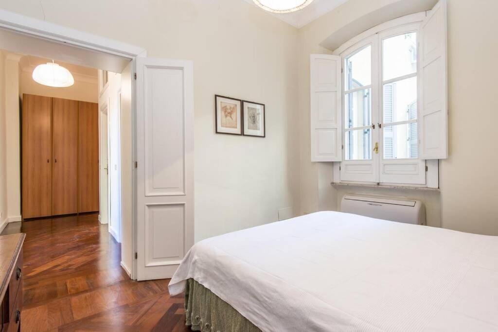 Łóżko lub łóżka w pokoju w obiekcie Vatican Large Comfortable Apartment