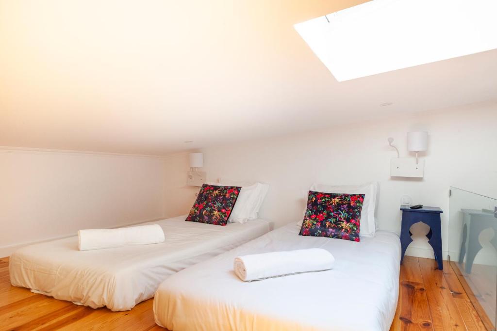 Postel nebo postele na pokoji v ubytování Lisbon Chillout Apartments