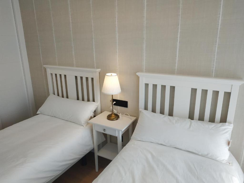 Cama ou camas em um quarto em CANELAS Beach