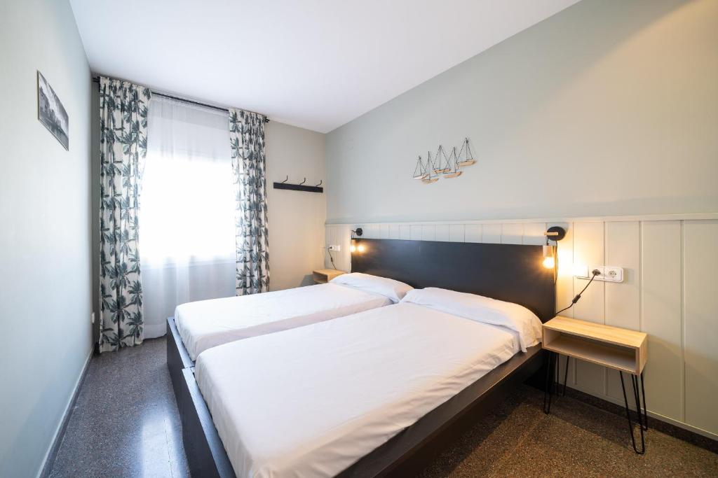 Postel nebo postele na pokoji v ubytování Villa Sabina
