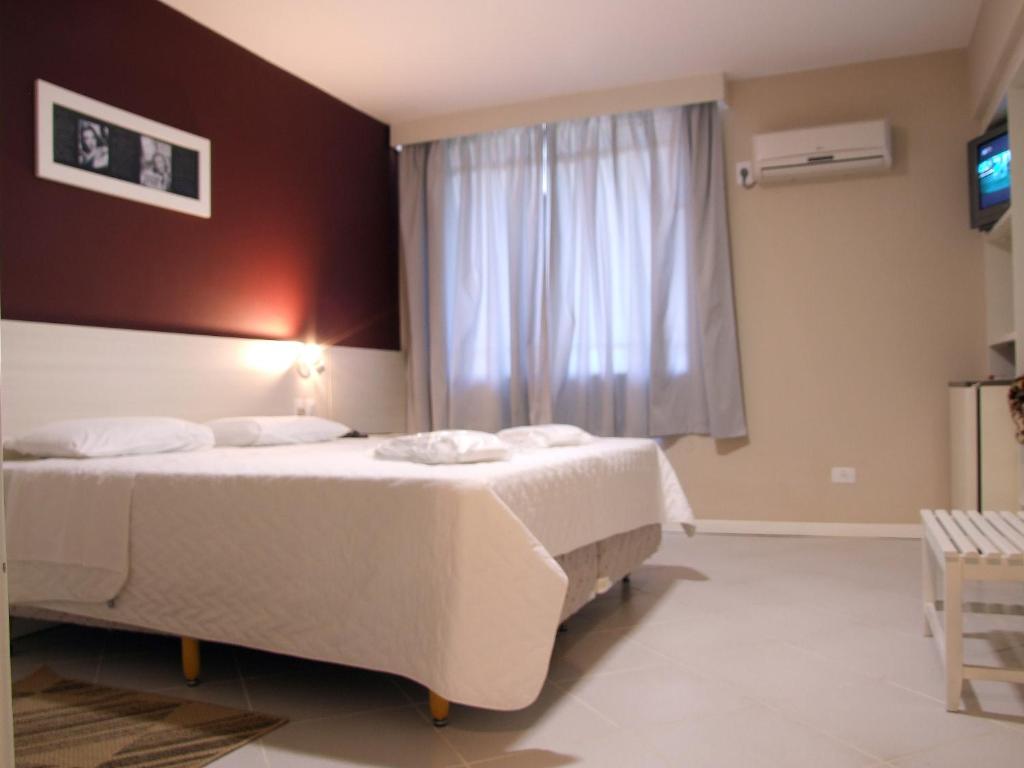 Postel nebo postele na pokoji v ubytování Hotel Emacite Flex
