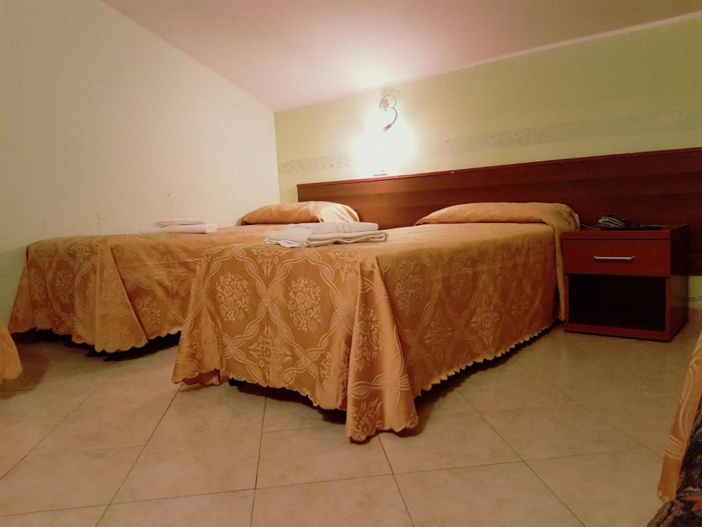Postel nebo postele na pokoji v ubytování Villa Altieri