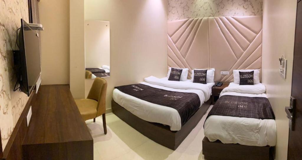 Hotel Blossom Inn - Habitación Triple De Lujo