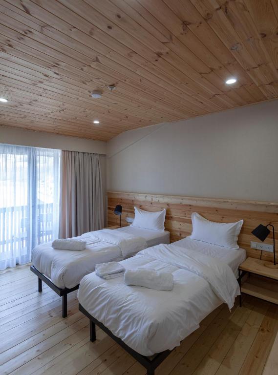 Postel nebo postele na pokoji v ubytování Lahili Boutique Hotel