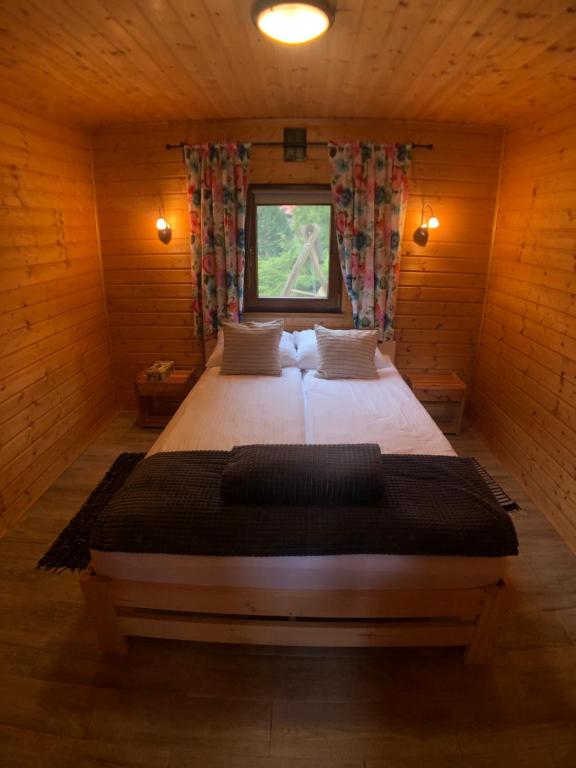 Postel nebo postele na pokoji v ubytování Pod lipą