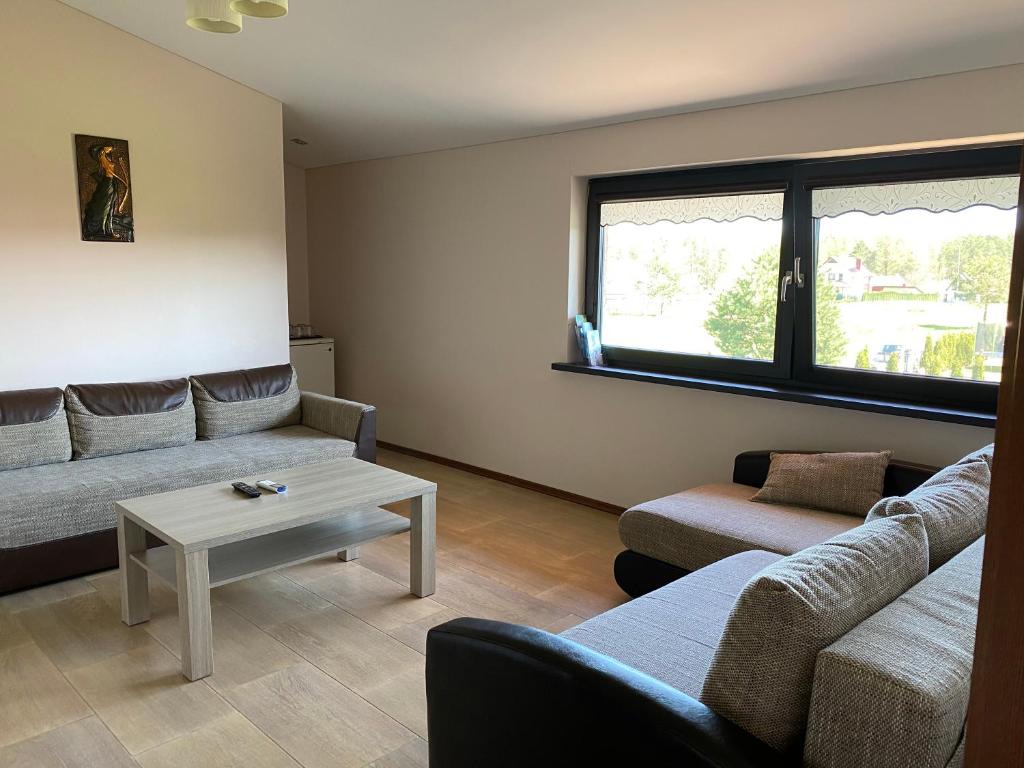 Posezení v ubytování Guest House Atostogana