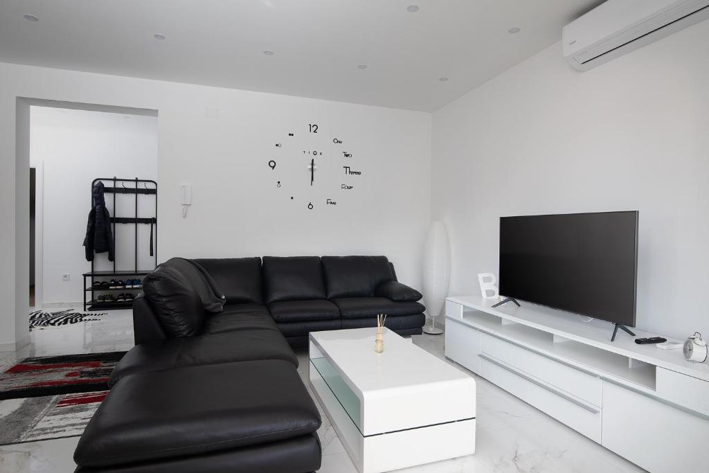 TV a/nebo společenská místnost v ubytování Apartments Jan&Enzo