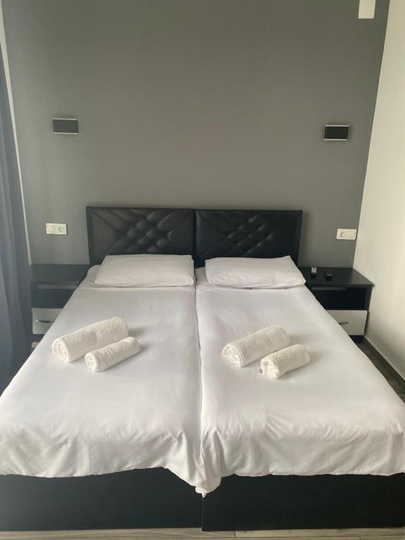 Postel nebo postele na pokoji v ubytování Hotel Niko