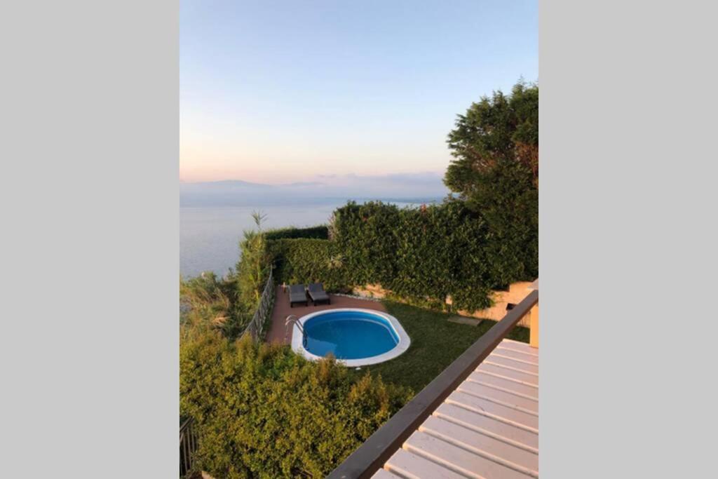 Výhled na bazén z ubytování Elegant Villa with Private Pool with Coastal Views nebo okolí