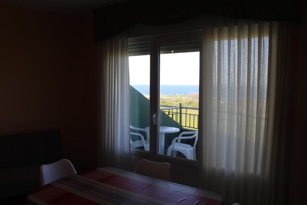 Posteľ alebo postele v izbe v ubytovaní Apartamentos Los Gemelos