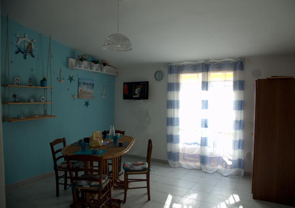 A television and/or entertainment centre at Giulymar