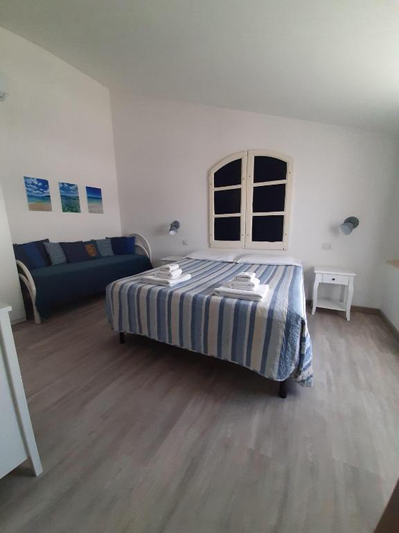 Postel nebo postele na pokoji v ubytování Cuscino e Cappuccino B&B