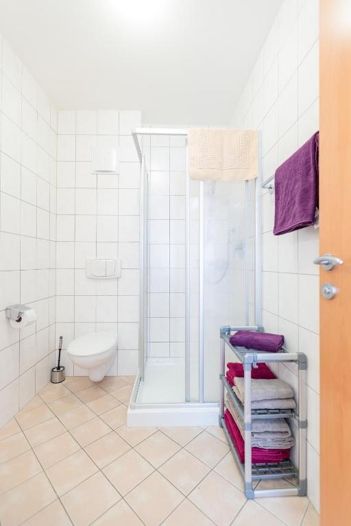 Koupelna v ubytování Appartements Avenzio
