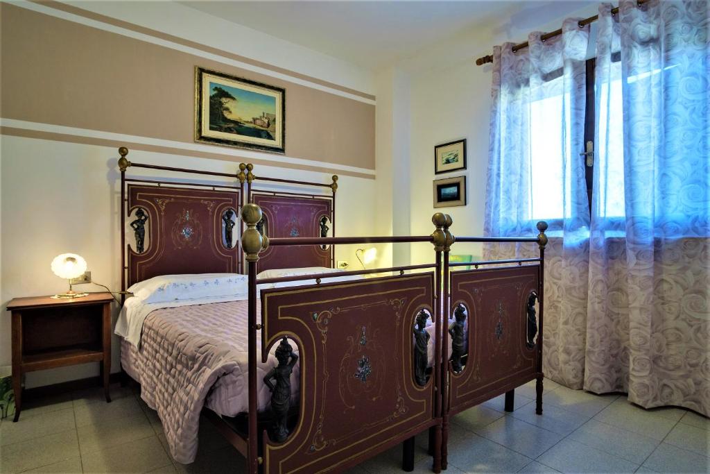 Posteľ alebo postele v izbe v ubytovaní B&B La mia Oasi