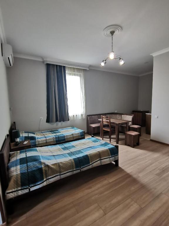 Postel nebo postele na pokoji v ubytování Guest House Eden