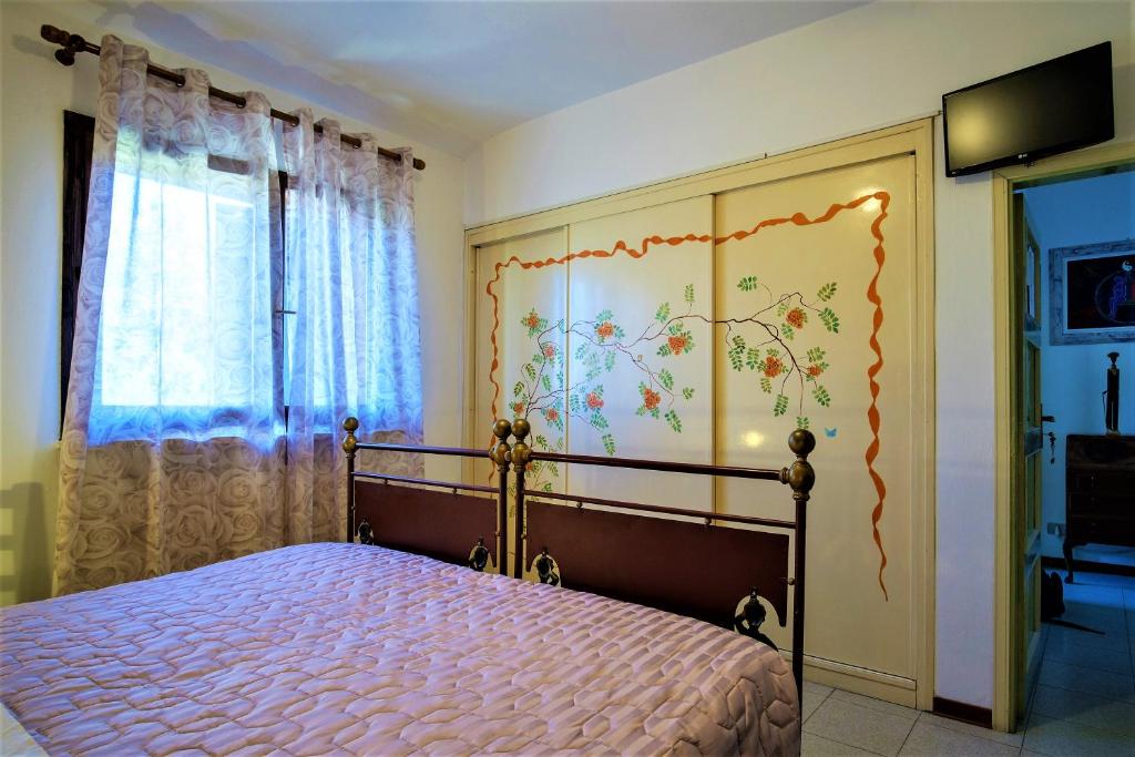 Posteľ alebo postele v izbe v ubytovaní B&B La mia Oasi