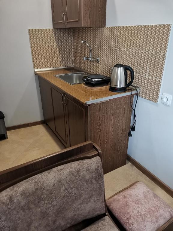 Kuchyň nebo kuchyňský kout v ubytování Guest House Eden