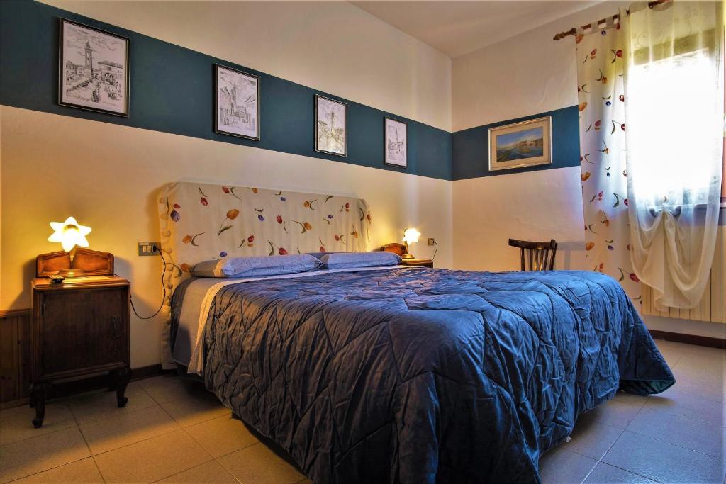 Posteľ alebo postele v izbe v ubytovaní B&B La mia Oasi