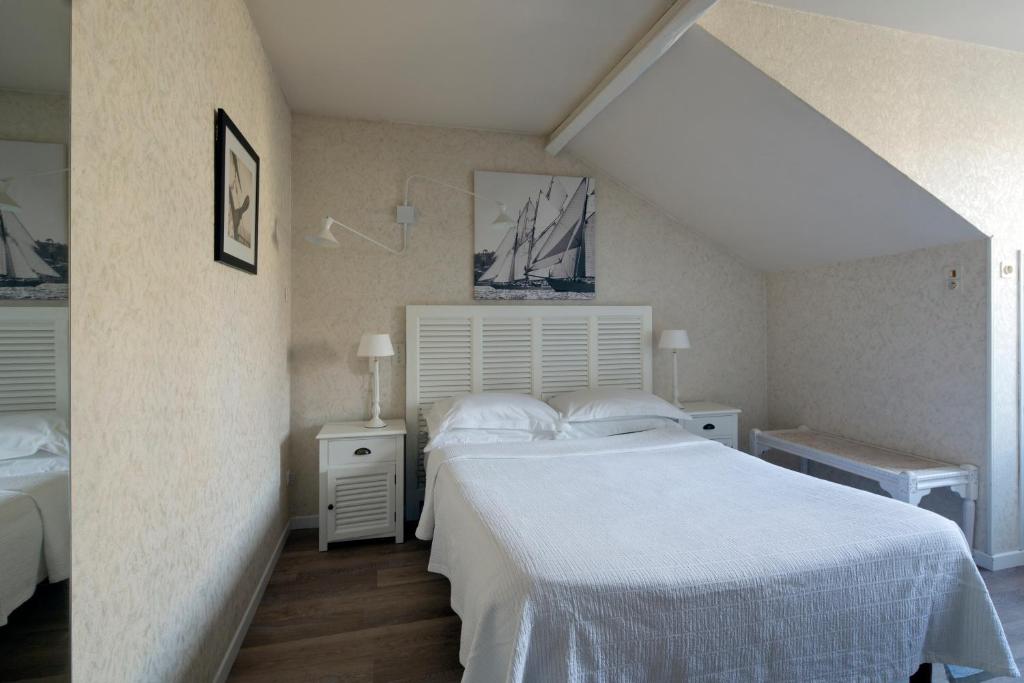 Giường trong phòng chung tại Villa Saint Hubert