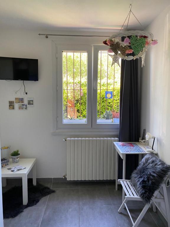 Телевизор и/или развлекательный центр в B&B Sole