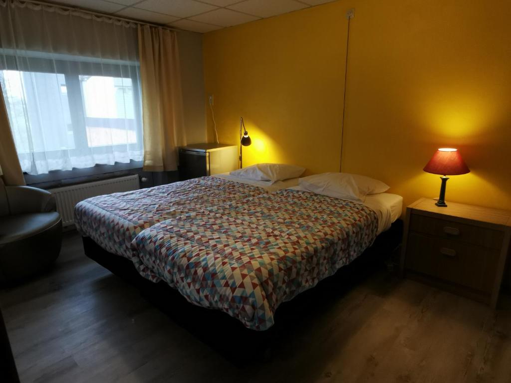 Postel nebo postele na pokoji v ubytování Chez Phil