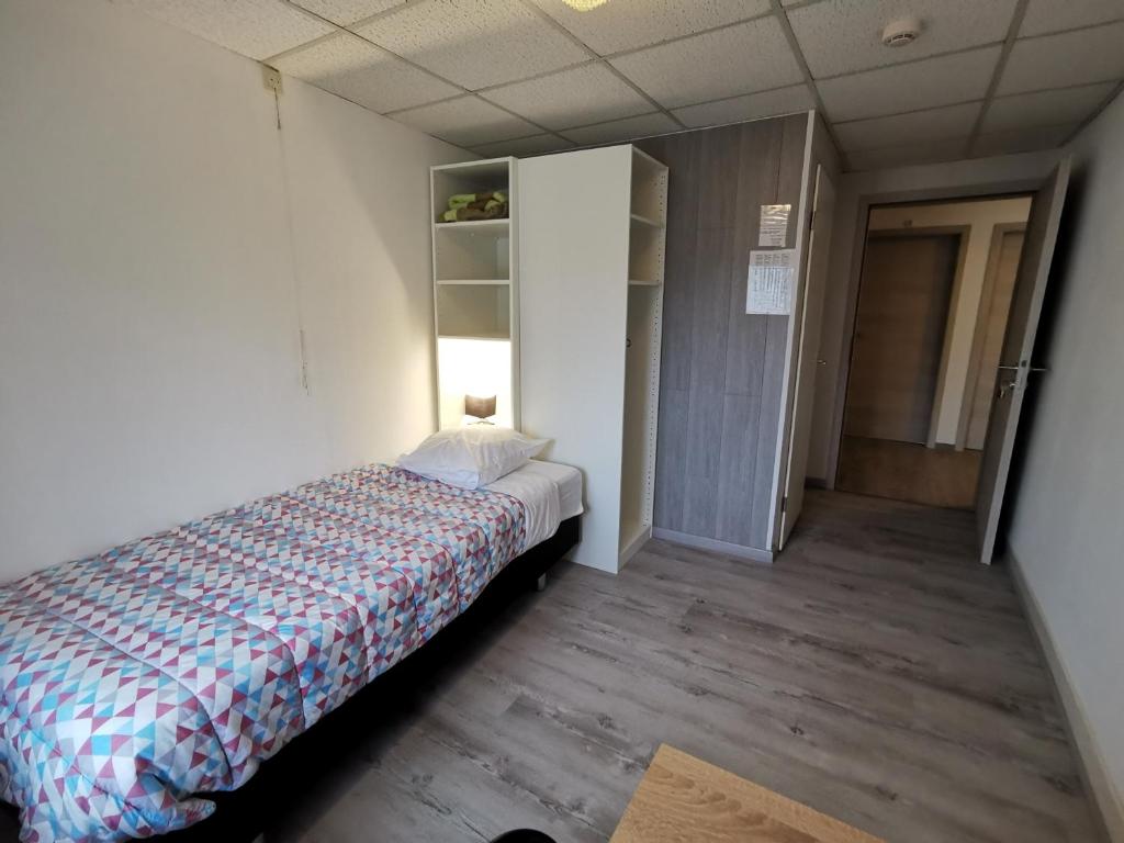 Postel nebo postele na pokoji v ubytování Chez Phil
