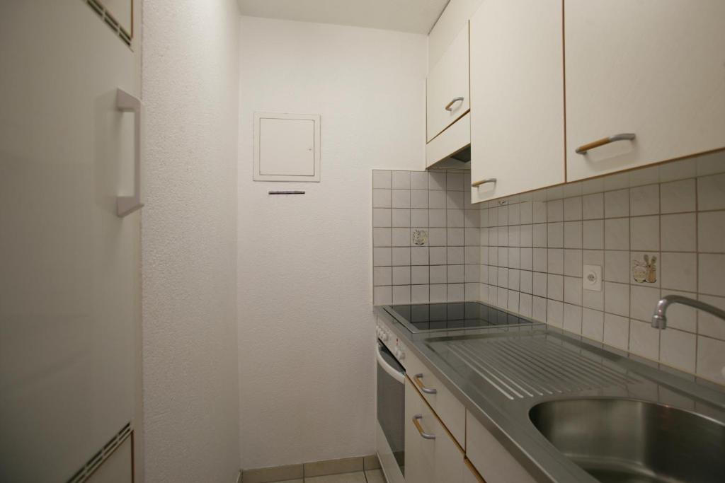 Kuchyň nebo kuchyňský kout v ubytování Baron / Baronesse Apartments