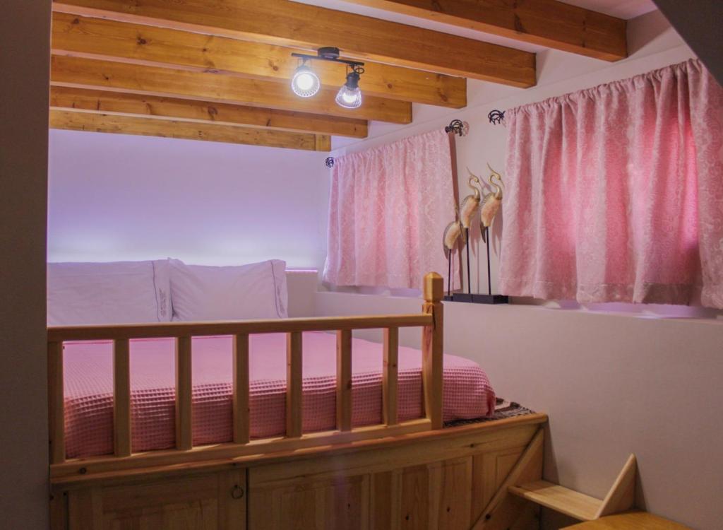 Postel nebo postele na pokoji v ubytování Villa Limnioni
