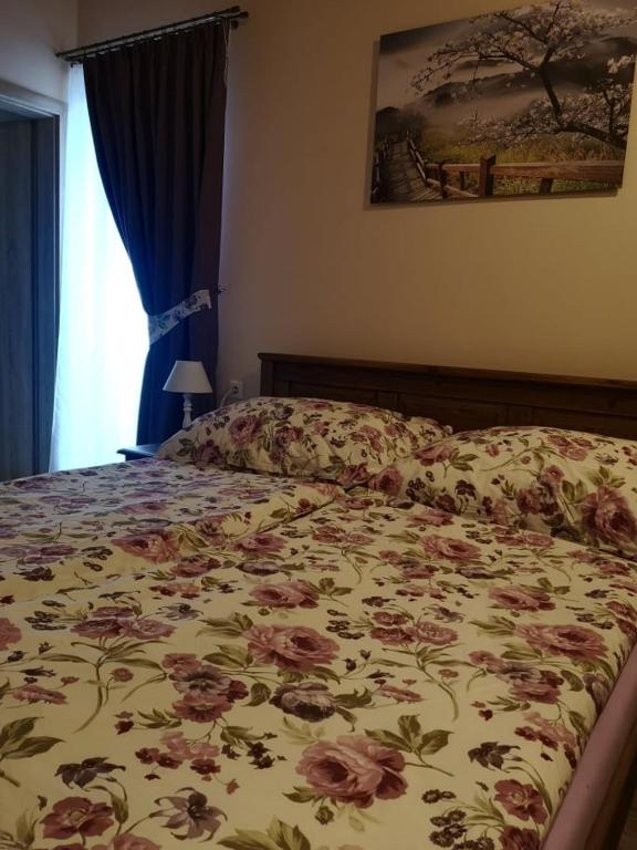 A bed or beds in a room at Penzión Thamasy