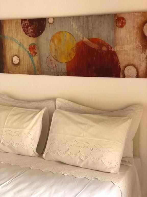 Postel nebo postele na pokoji v ubytování Pousada Romã