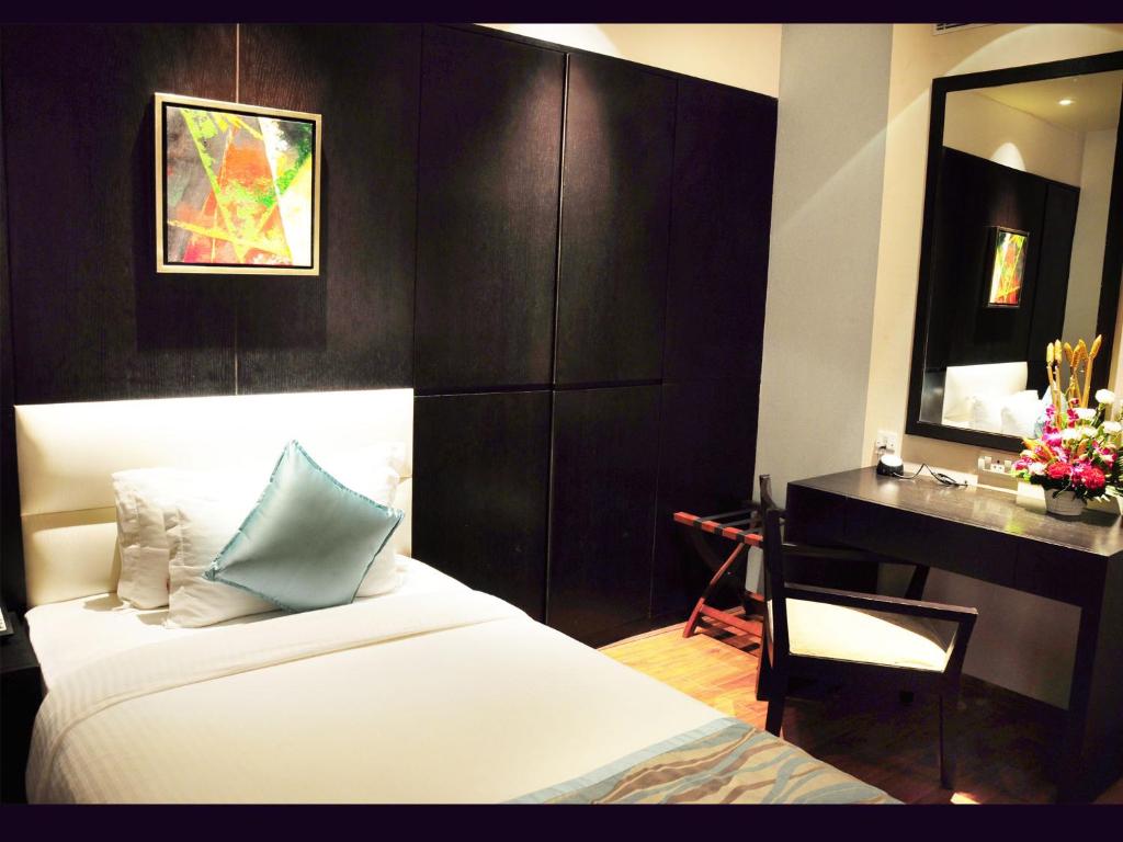 Postel nebo postele na pokoji v ubytování Hotel Senses