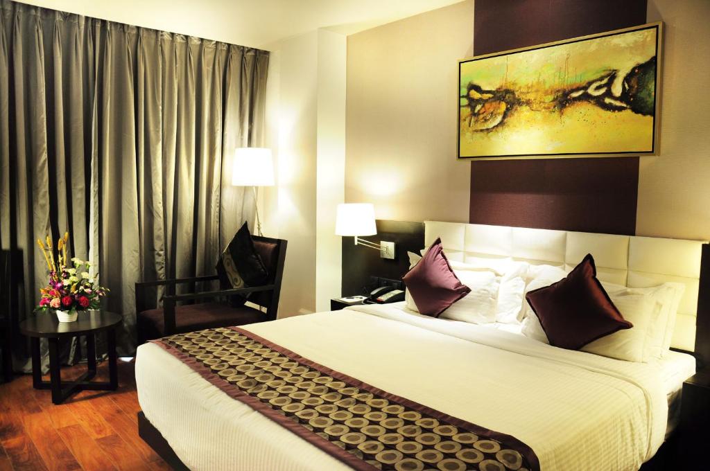 Postel nebo postele na pokoji v ubytování Hotel Senses