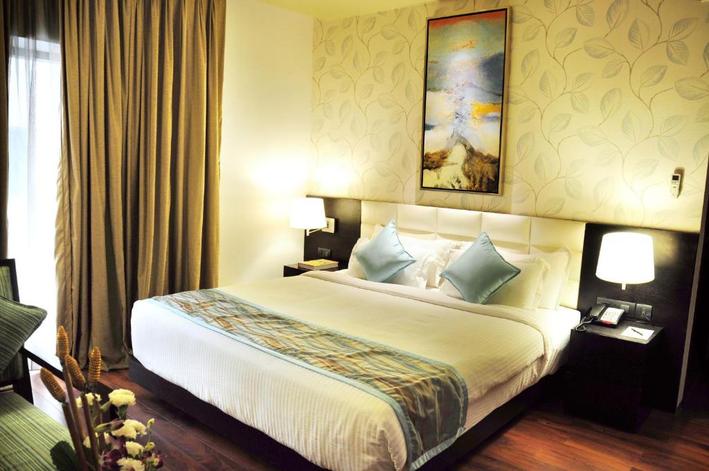 Postel nebo postele na pokoji v ubytování Hotel Senses