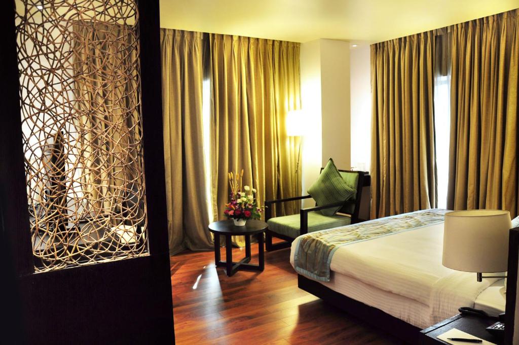 Postel nebo postele na pokoji v ubytování Hotel Senses