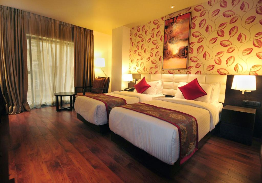 Postel nebo postele na pokoji v ubytování Hotel Senses