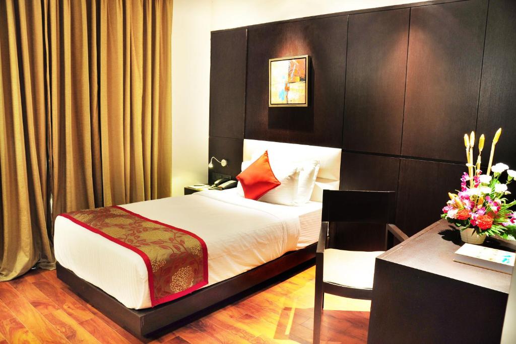 Postel nebo postele na pokoji v ubytování Hotel Senses